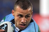 Blake Ferguson is tackled during State of Origin.