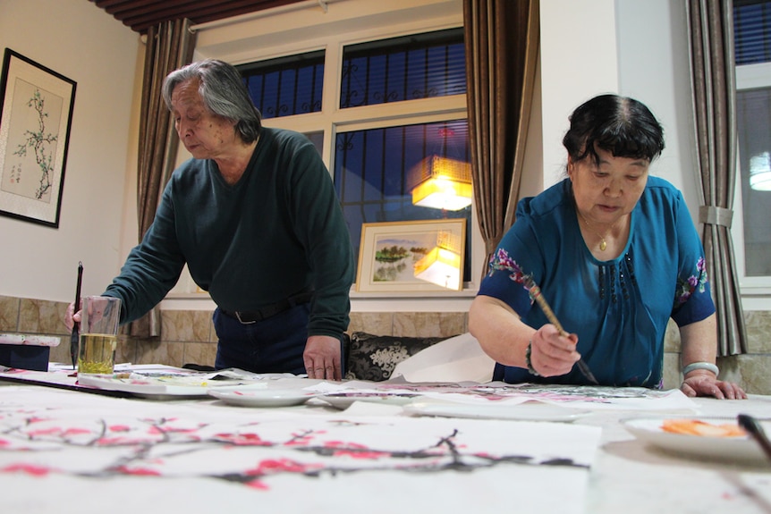 Chinese symbols painted on paper