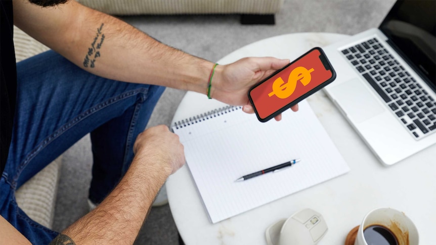 Aerial shot of man looking at phone