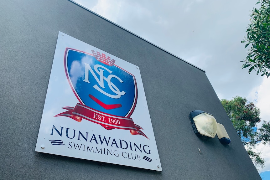 A Nunawading Swimming Club sign.