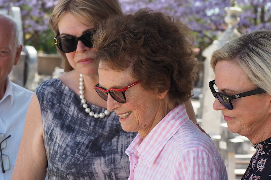 Deirdre Rudd and her daughters and Pastor Dean Shone.