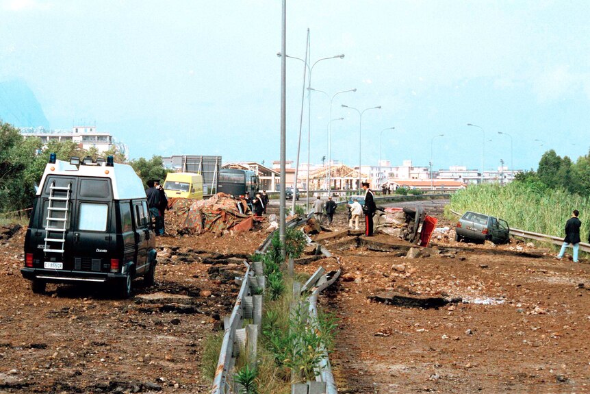 A 1992 file photo shows the damage at a highway that links Palermo to its airport.