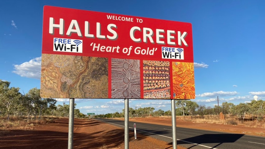 'Welcome to Halls Creek' sign.
