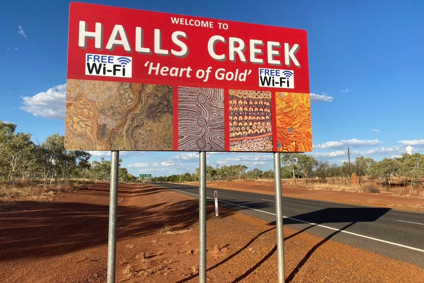 'Welcome to Halls Creek' sign.