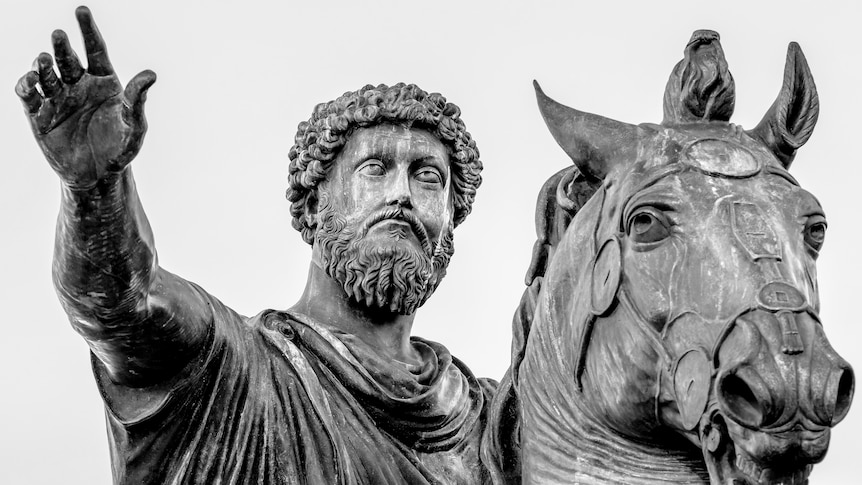 A classical statue of a man on a horse in Rome