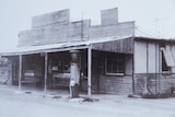 Photo of black and white store.