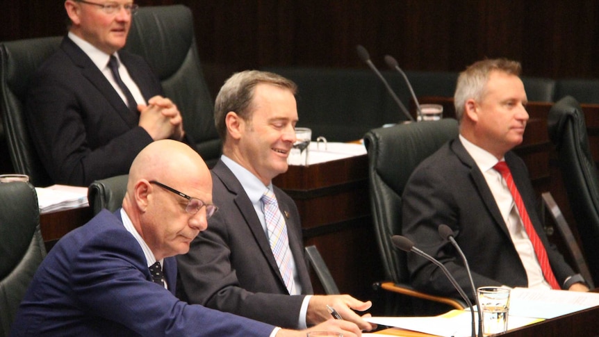 Tasmanian Ministers Peter Gutwein (front left), Michael Ferguson, Jeremy Rockliff and Roger Jaensch (rear) in Parliament.