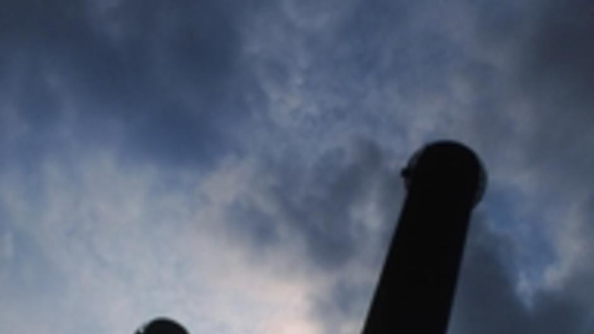 File photo: Smoke and smoke stack silhouettes