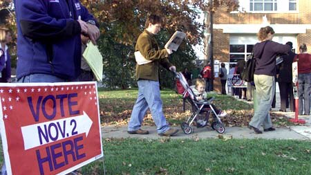 Voters line up to vote in the 2004 US presidential election