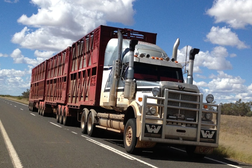 Road train on highway in central-west Qld in April, 2013