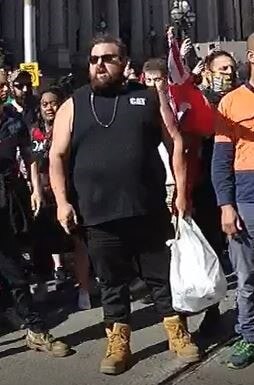 A man police want to speak to over an anti-lockdown protest in Melbourne.