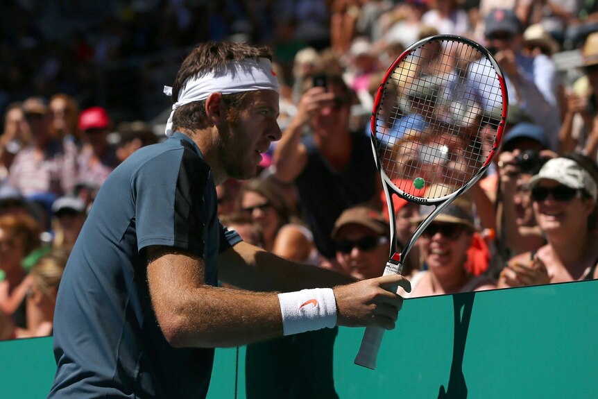 Argentina's Juan Martin del Potro rests between points against Jeremy Chardy of France.