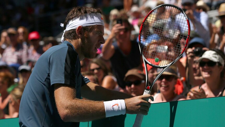 Argentina's Juan Martin del Potro rests between points against Jeremy Chardy of France.