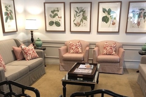 Living room with nice art and comfy chairs