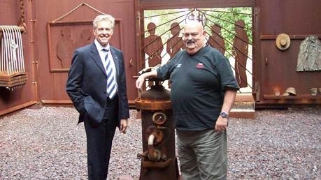 Newcastle Liberal MP Tim Owen and former BHP steelworks employee Aubrey Brooks.