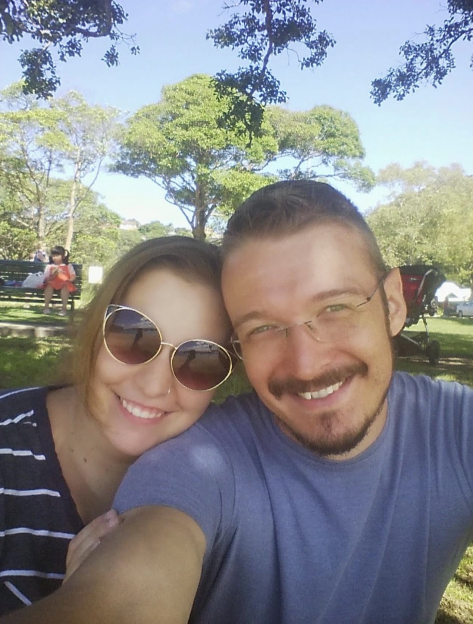 A selfie image of a man and a woman.