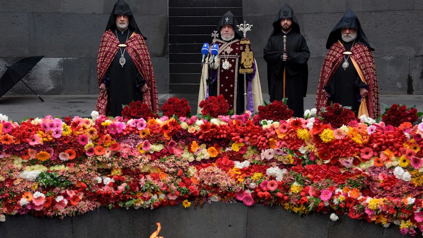The head of the Armenian Apostolic Church attends a ceremony to commemorate the 105th anniversary of the Armenian Genocide.