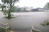 Heavy rain and flooding in a school playground