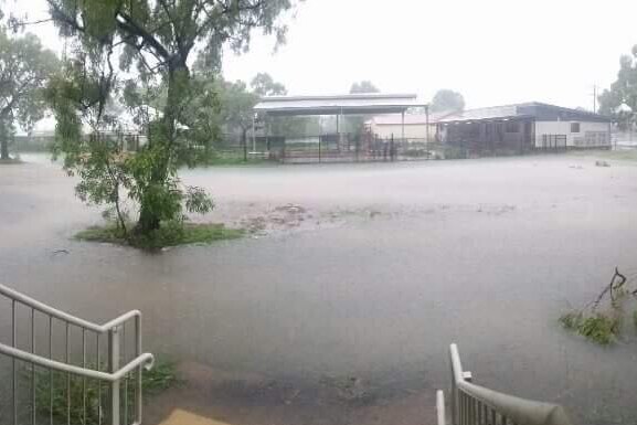 Heavy rain and flooding in a school playground