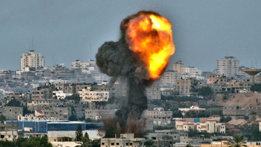 Smoke billows from a spot targeted by an Israeli air strike inside the Gaza Strip.