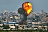 Smoke billows from a spot targeted by an Israeli air strike inside the Gaza Strip.