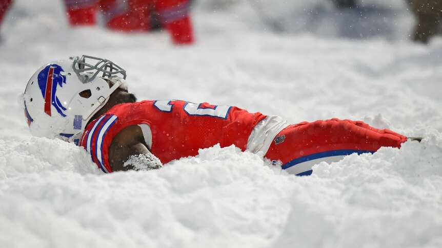 Buffalo Bills' Shamarko Thomas celebrates in the snow