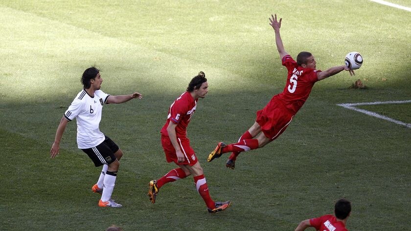 Nemanja Vidic handed Germany a lifeline with another absurd handball in the penalty area.