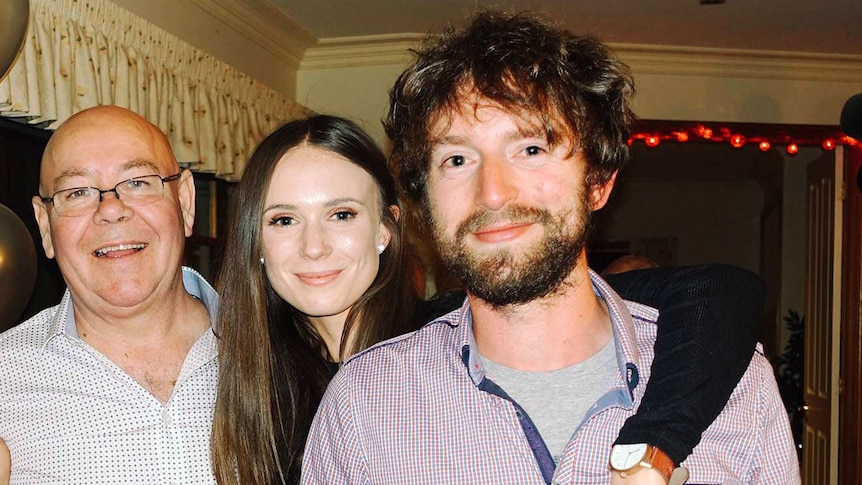 Nicola Trotman with her mum, dad and brother at a party