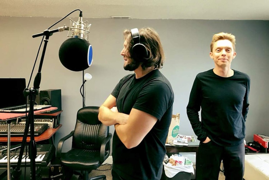 Ryan Nicodemus and Joshua Millburn standing in their recordning studio.