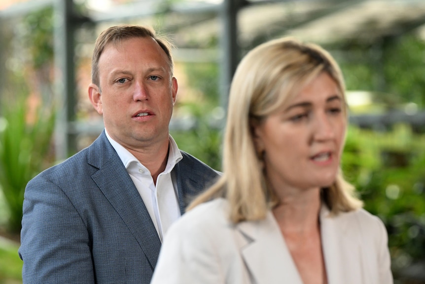 Queensland Deputy Premier, Steven Miles looks on as Minister for Health, Shannon Fentiman speaks