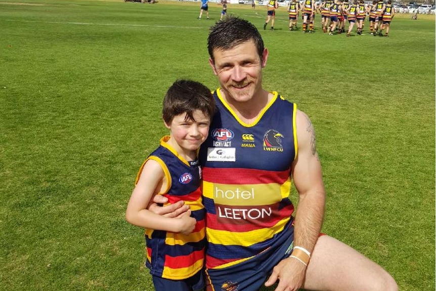 Neil Irwin and son Lewis at the AFl grand final