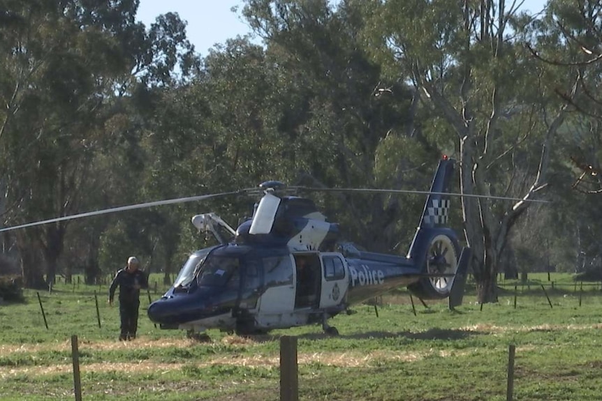 police helicopter lands in bushland