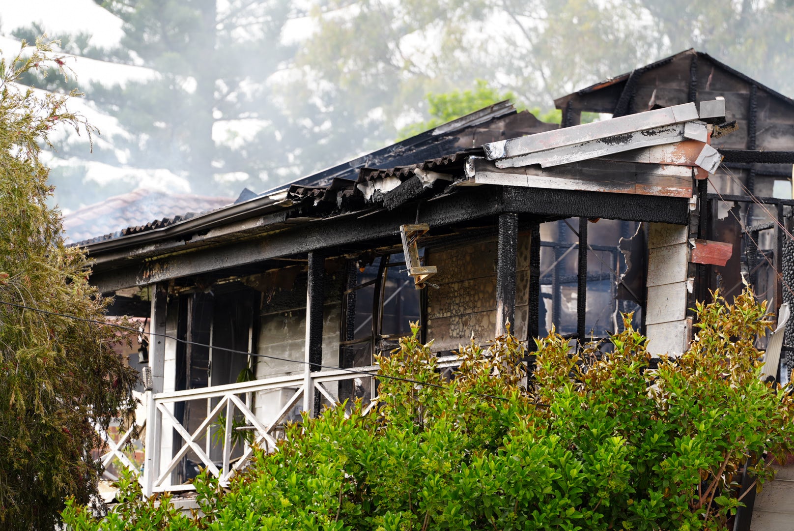 Teen charged over Sydney house fire with 88yo woman inside