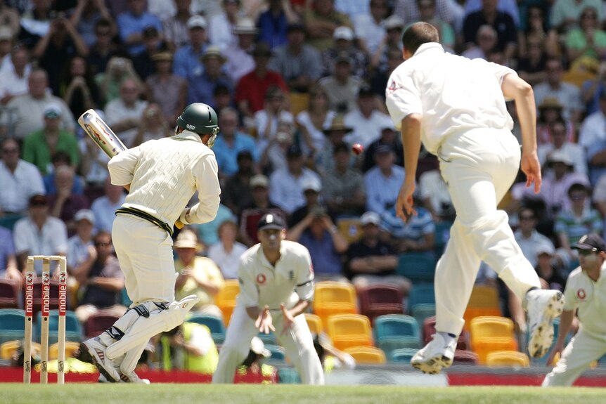 Justin Langer reacts as Steve Harmison bowls a ball that is headed towards Andrew Flintoff at second slip