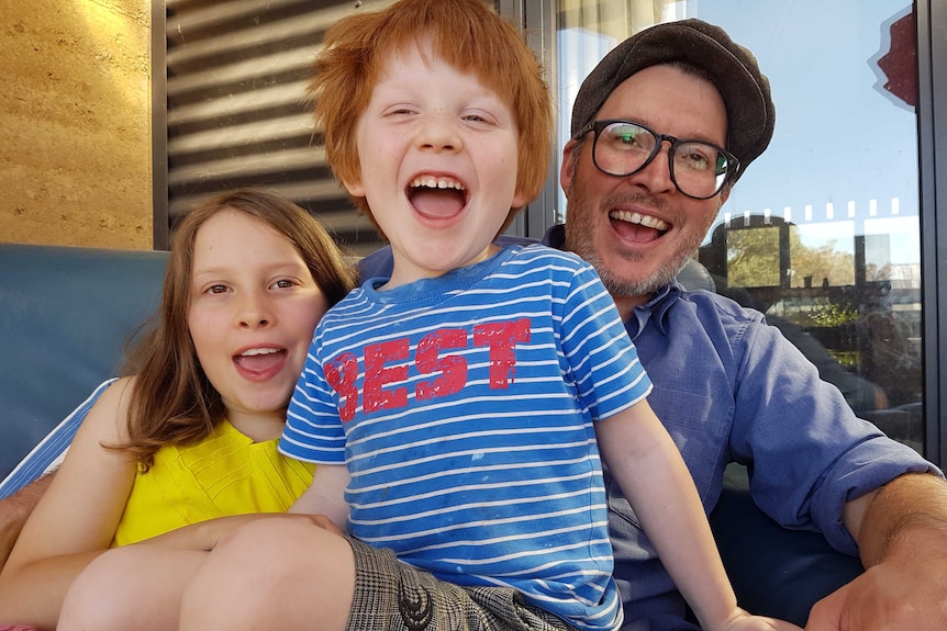 Rhys Allen with his two children.