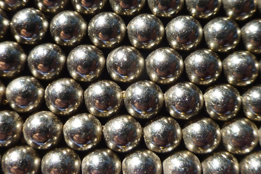 small metallic balls stuck to each other