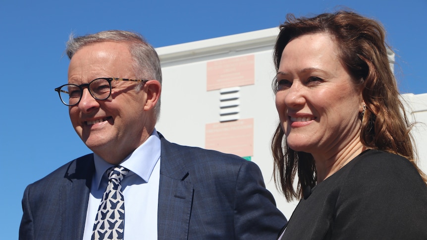Anthony Albanese and Tania Lawrence stand next to each other smiling