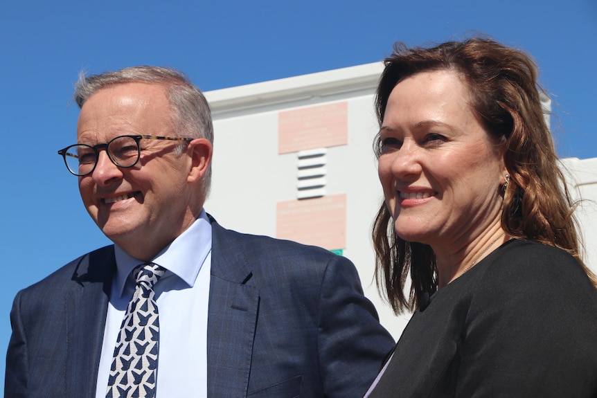 Anthony Albanese and Tania Lawrence stand next to each other smiling