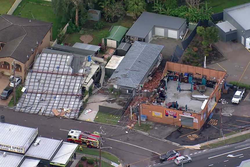 torn off roofs at wyong after a storm caused destruction