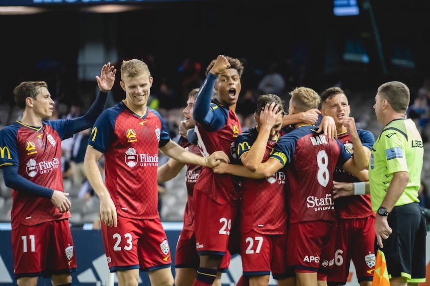 Kusini Yengi, center, Forward for A-League Adelaide United