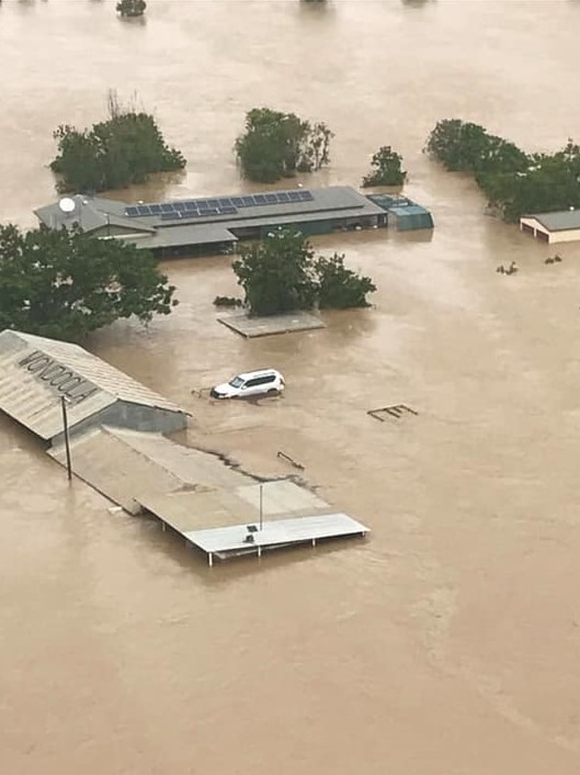 Cattle station buildings in flood