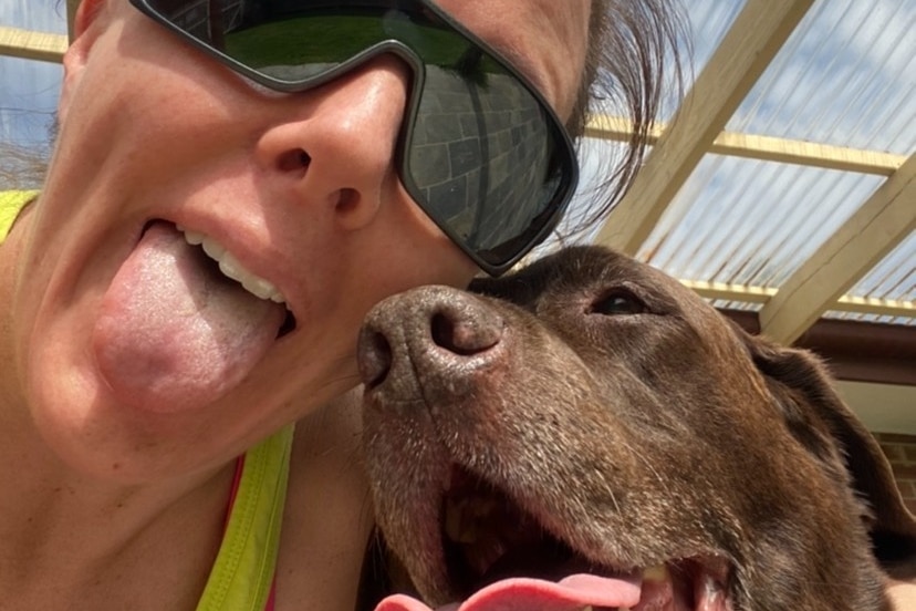 Laura Curtin takes a selfie with her dog.