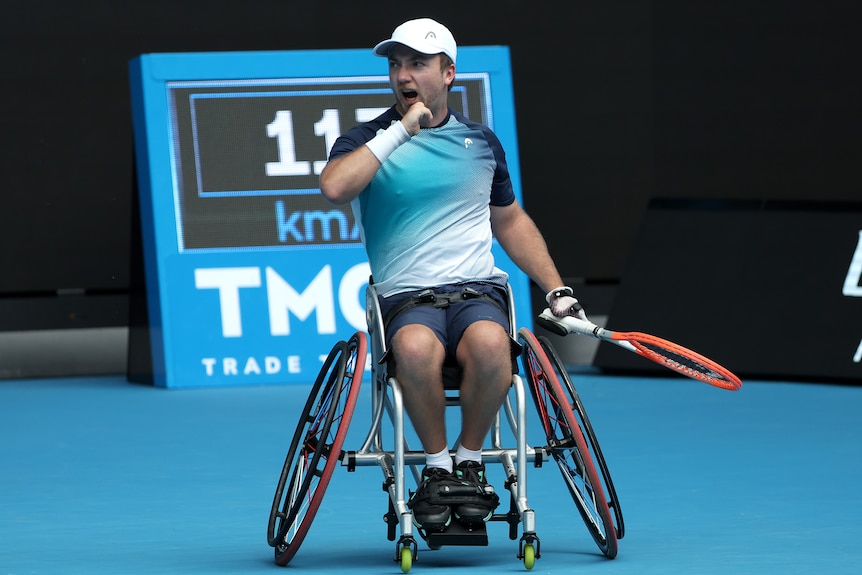 A Dutch male player pumps his fist as he celebrates winning a point in the quad wheelchair singles final at the Australian Open.