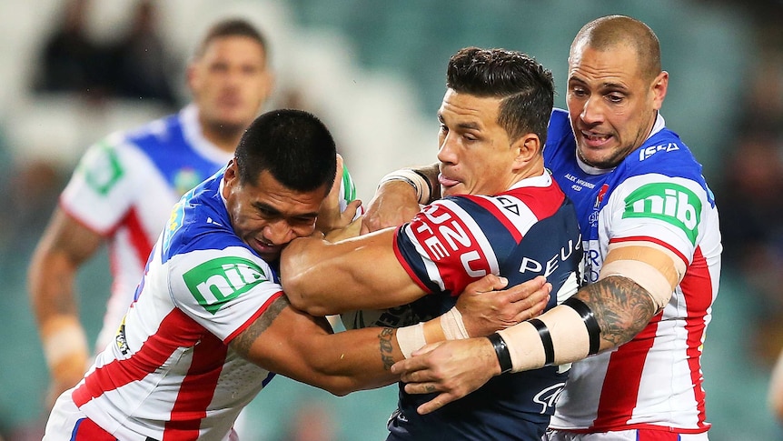 Sonny Bill Williams takes the bal forward for the Roosters