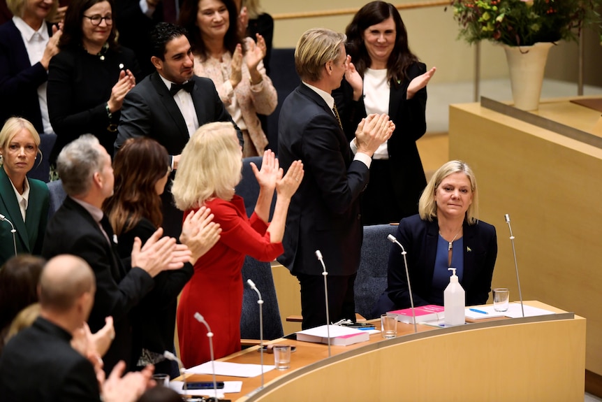 Magdalena Andersson applauded in parliament.