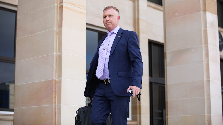 James Hayward walking outside WA parliament.