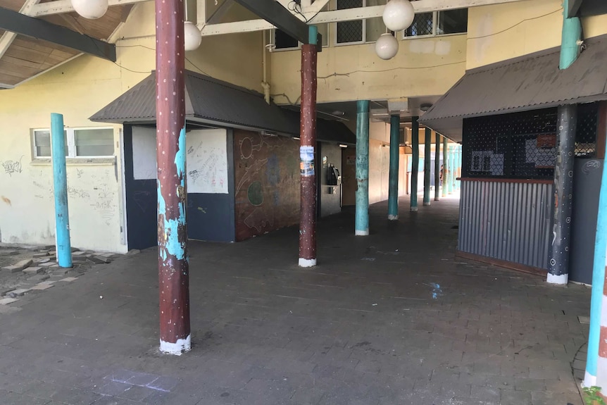 A run-down area of the former resort lobby shows it has been left to degrade over time.