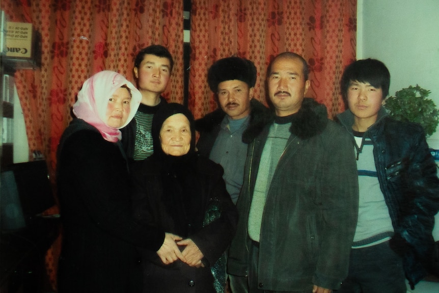 Relatives of Dilmaz Kerim pose for a family photo.