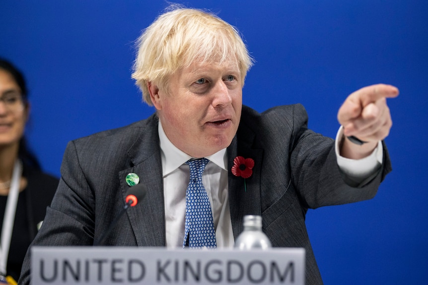 Britain's Boris Johnson gestures, during the opening ceremony of the COP26 Summit in Glasgow