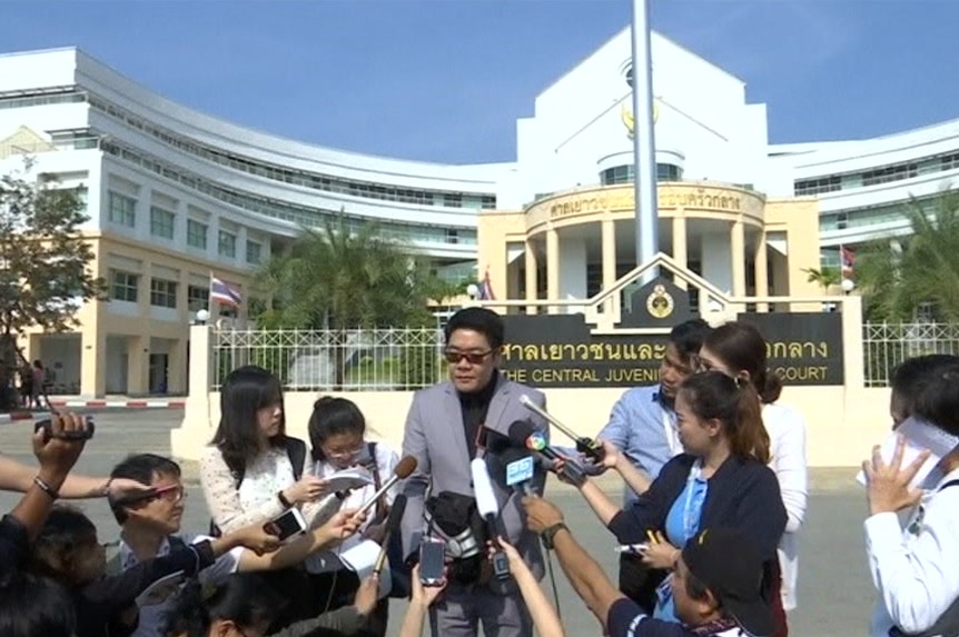 Thai lawyer Kong Suriyamonthon talks to the media.